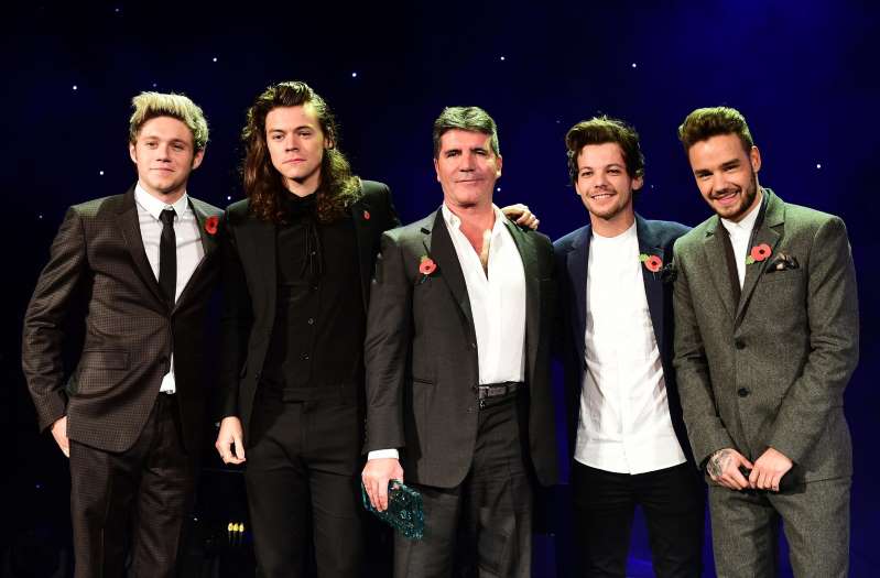 Niall Horan, Harry Styles, Simon Cowell, Louis Tomlinson, Liam Payne posing for a photo: The X Factor previously had huge success (Ian West/PA Archive/PA Images)