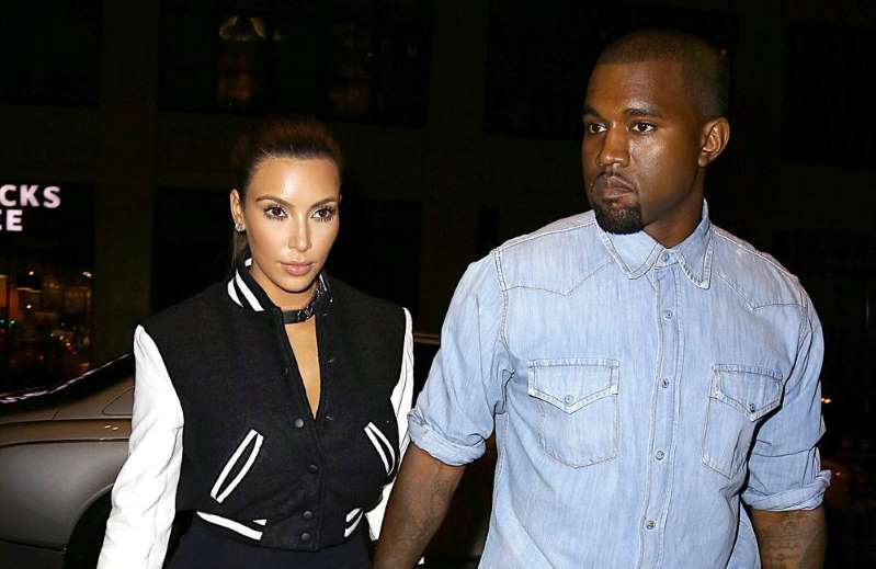 Kim Kardashian, Kanye West are posing for a picture: Kim Kardashian West and Kanye West