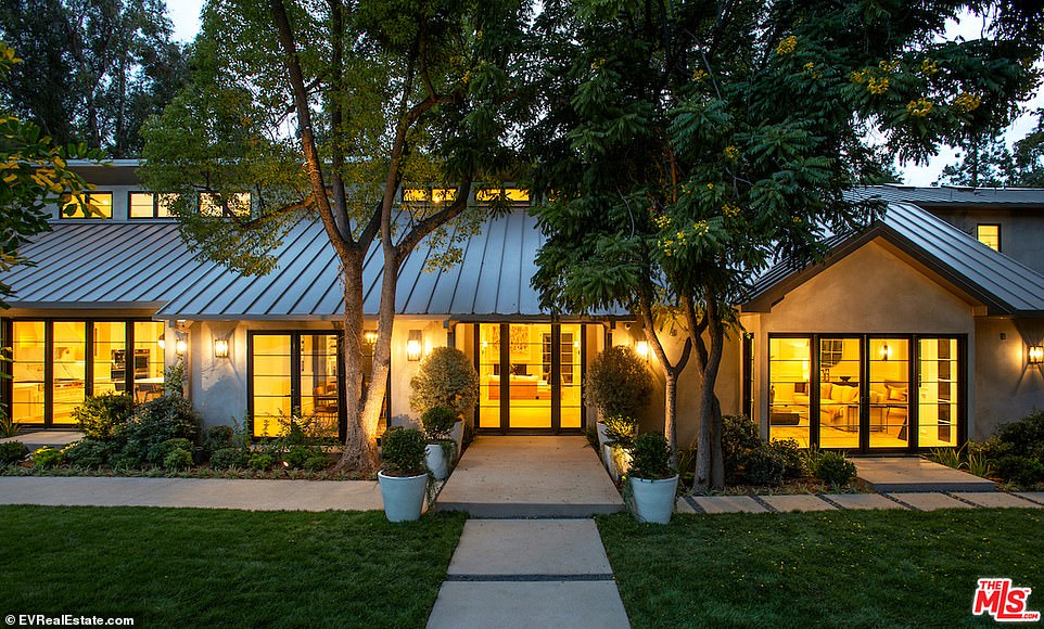 Large: With seven bedroom, 10 bathroom, and a resort style pool the actress and Good Charlotte guitarist will also 1.68 acres