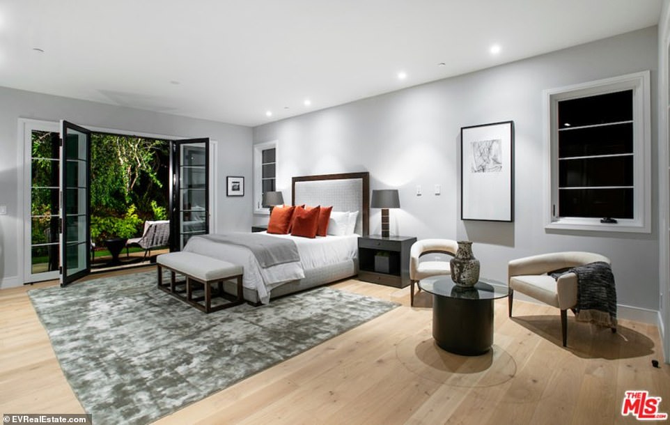 Spacious: Two bedrooms fill out the bottom level each with a bathroom and large closet